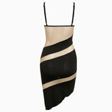 back view of a black and sheer striped dress