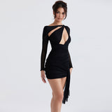 Front view of a woman in a black ruched mini dress with a draped accent.