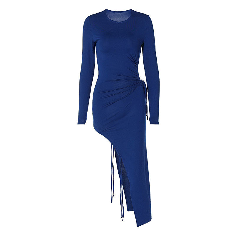 Blue long-sleeve asymmetrical dress with ruching and a high slit.