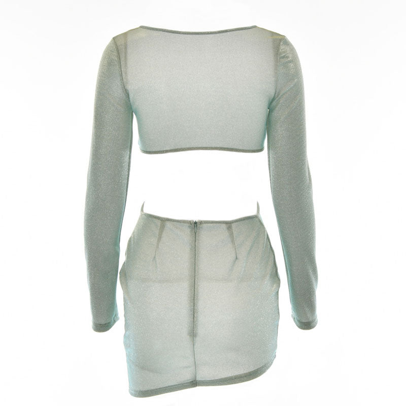 back view of a light blue sparkling long-sleeve mini dress with cut-out details and asymmetrical hem