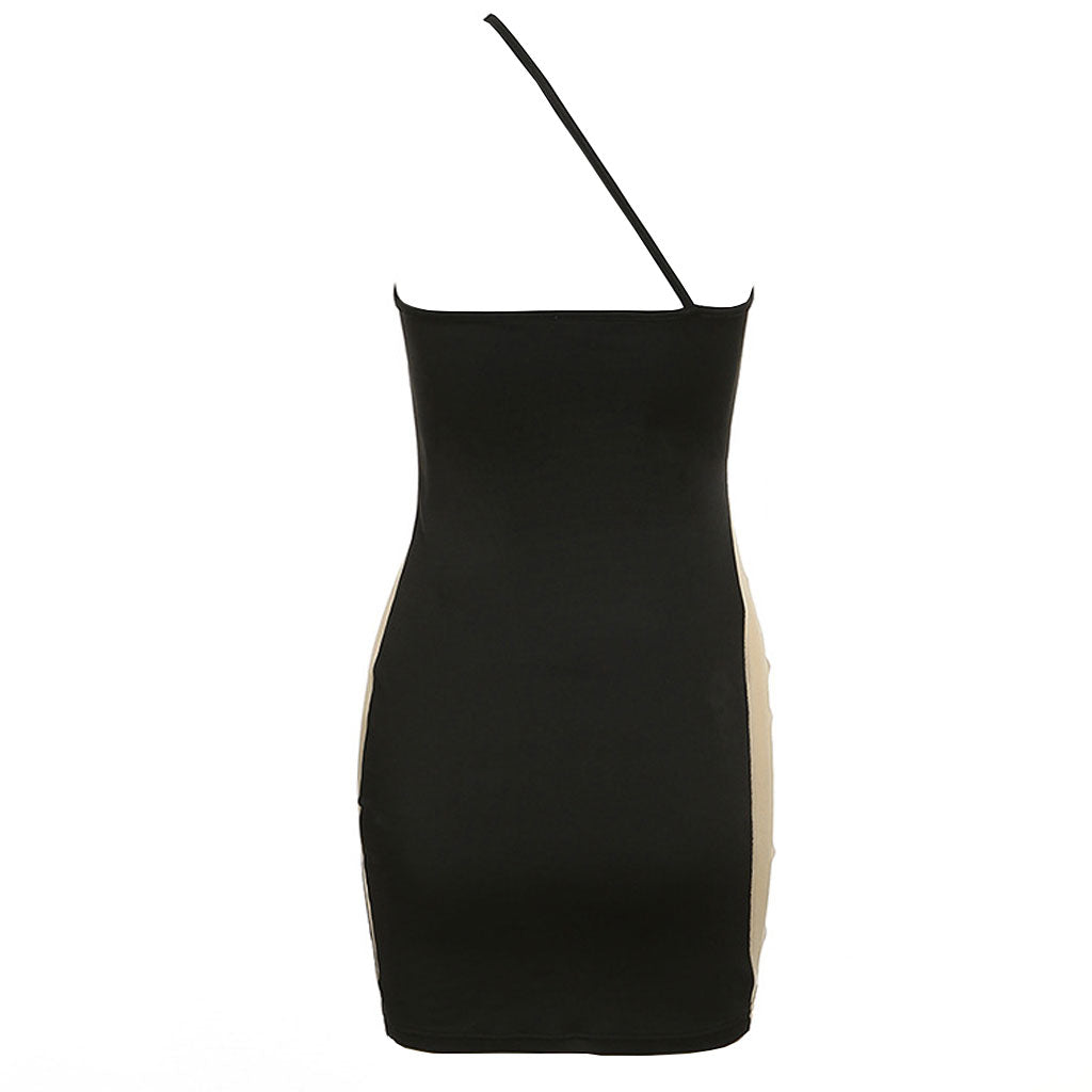 back view of a black and nude asymmetrical mini dress with a sheer side panel