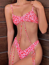 Pink floral print bikini set with ruched bust and adjustable ties