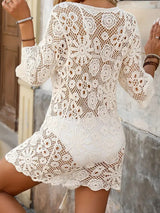 Close-up of the crochet pattern on the white beach dress.