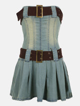 Front view of a strapless denim corset dress with brown belt details and a pleated skirt.