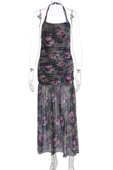 Floral print halter neck maxi dress displayed on a mannequin