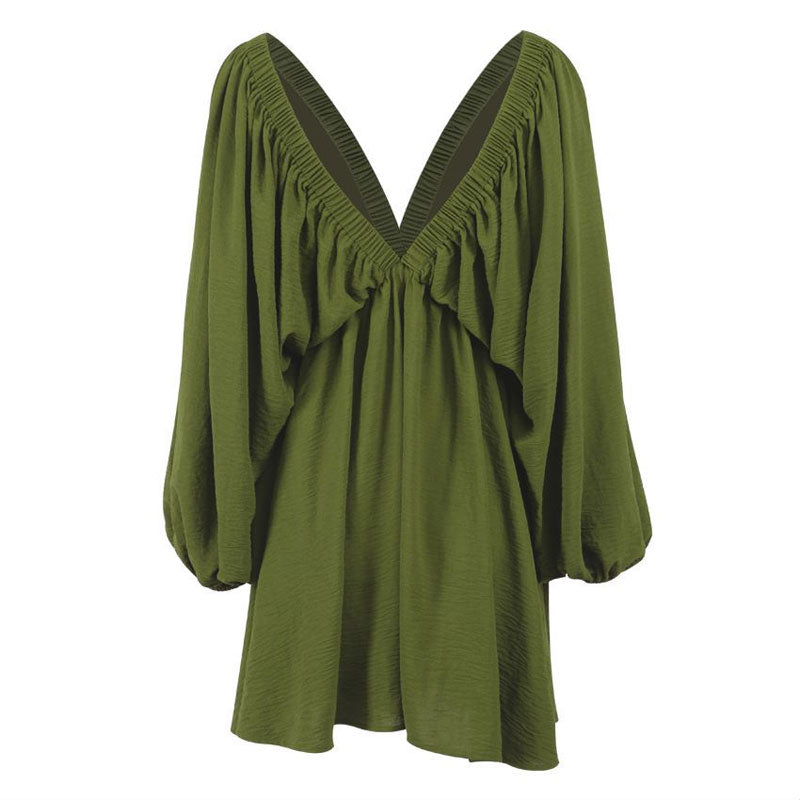 Green V-neck dress with bishop sleeves