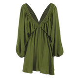 Green V-neck dress with bishop sleeves