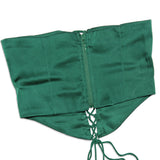 Close-up of a green satin bustier with lace trim and lace-up detail
