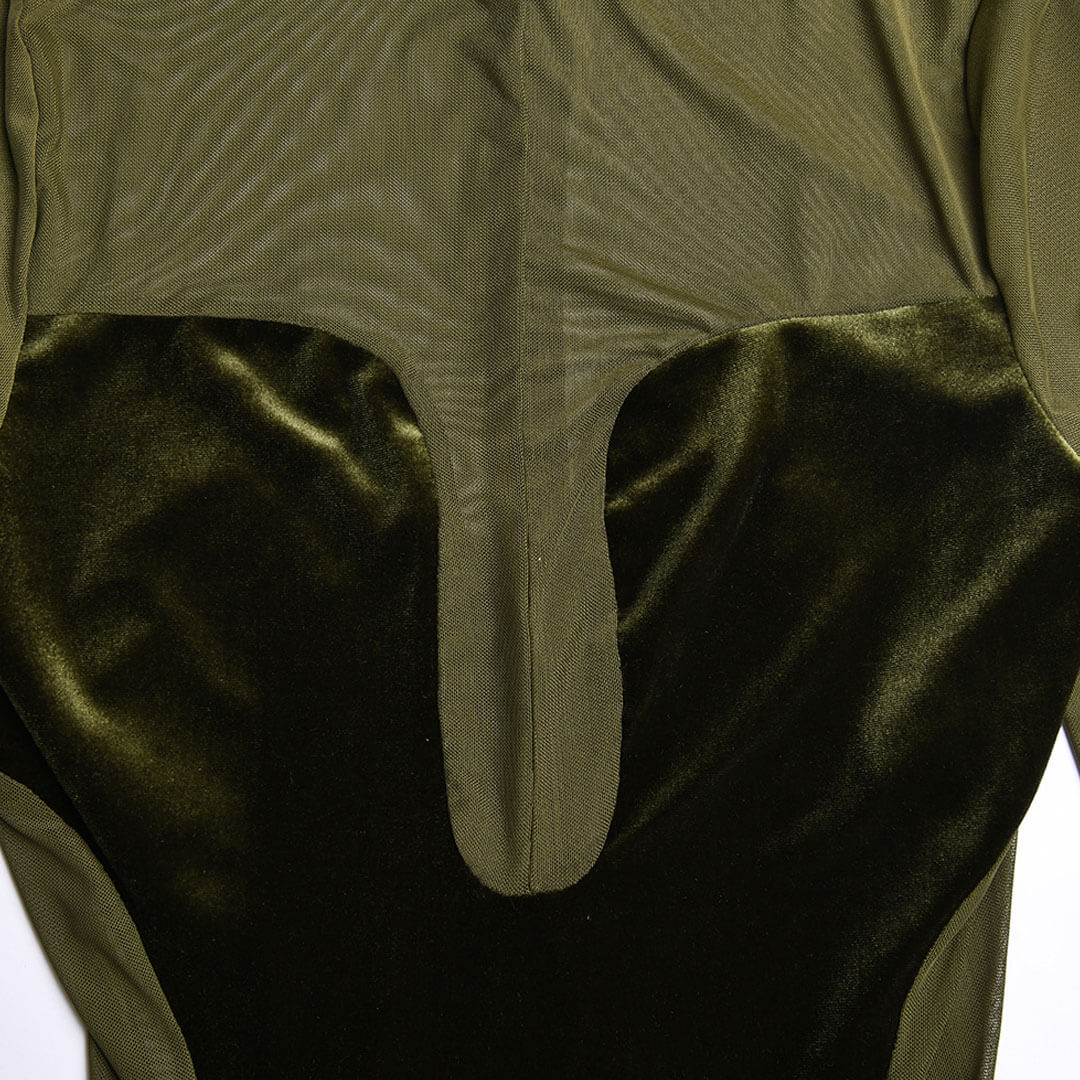 Close-up of the neckline and bodice of an olive green velvet and mesh dress