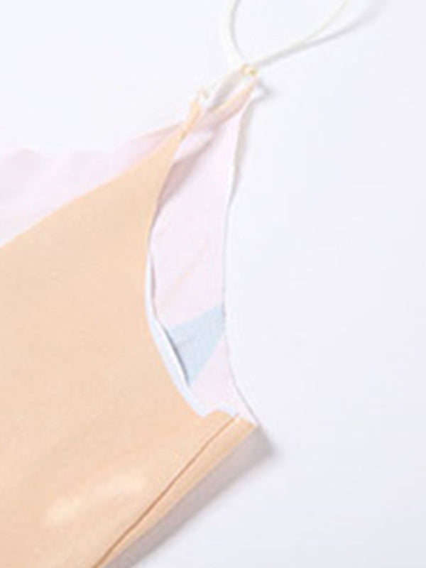 Close-up of the spaghetti strap detail on the dress