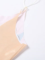 Close-up of the spaghetti strap detail on the dress