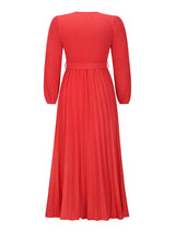 back view of a red pleated maxi dress with a tie waist