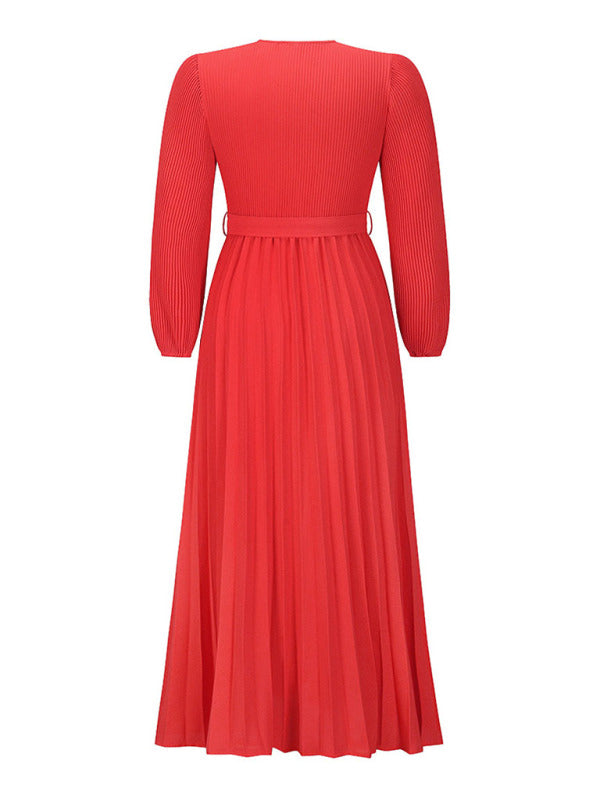 back view of a red pleated maxi dress with a tie waist