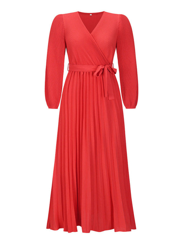 front view of a red pleated maxi dress with a tie waist