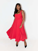 woman in red fit and flare midi dress with square neckline