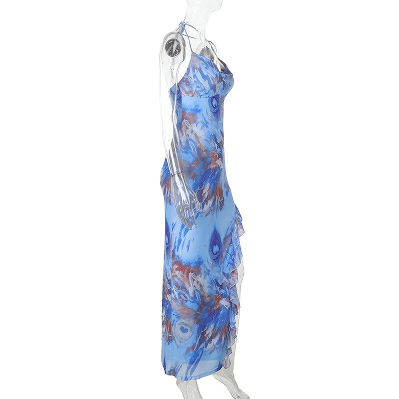 Side view of a blue abstract print halter maxi dress on a mannequin