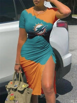 Woman wearing a Miami Dolphins themed bodycon midi dress with a high slit.