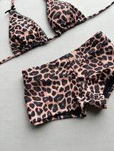 Close-up of the leopard print low-rise bikini bottom.