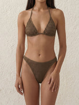 Woman wearing a brown crinkle knit triangle bikini