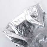 close-up of the strapless neckline of a silver metallic faux leather dress
