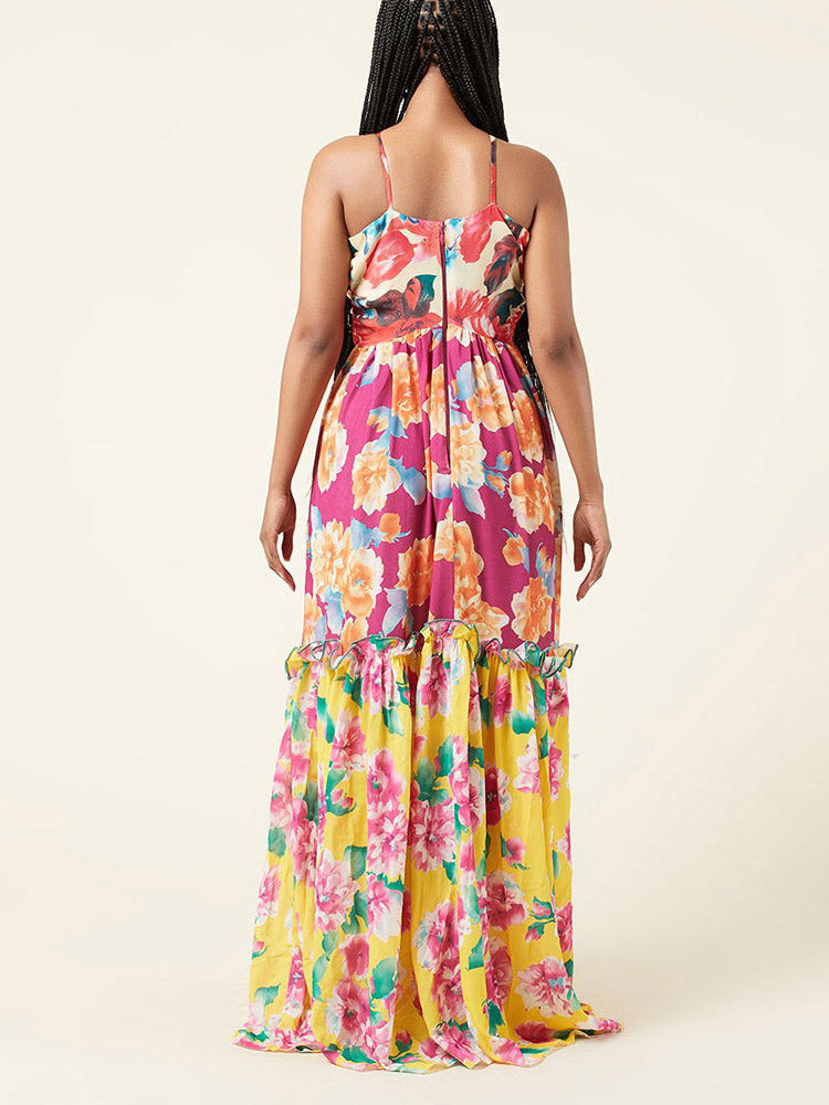 Back view of a woman in a floral print maxi dress.