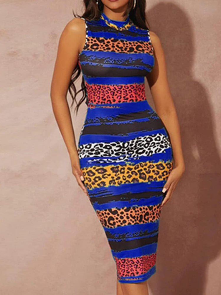 Woman wearing a sleeveless mock neck bodycon sheath dress with an abstract stripe and leopard print pattern, front view.