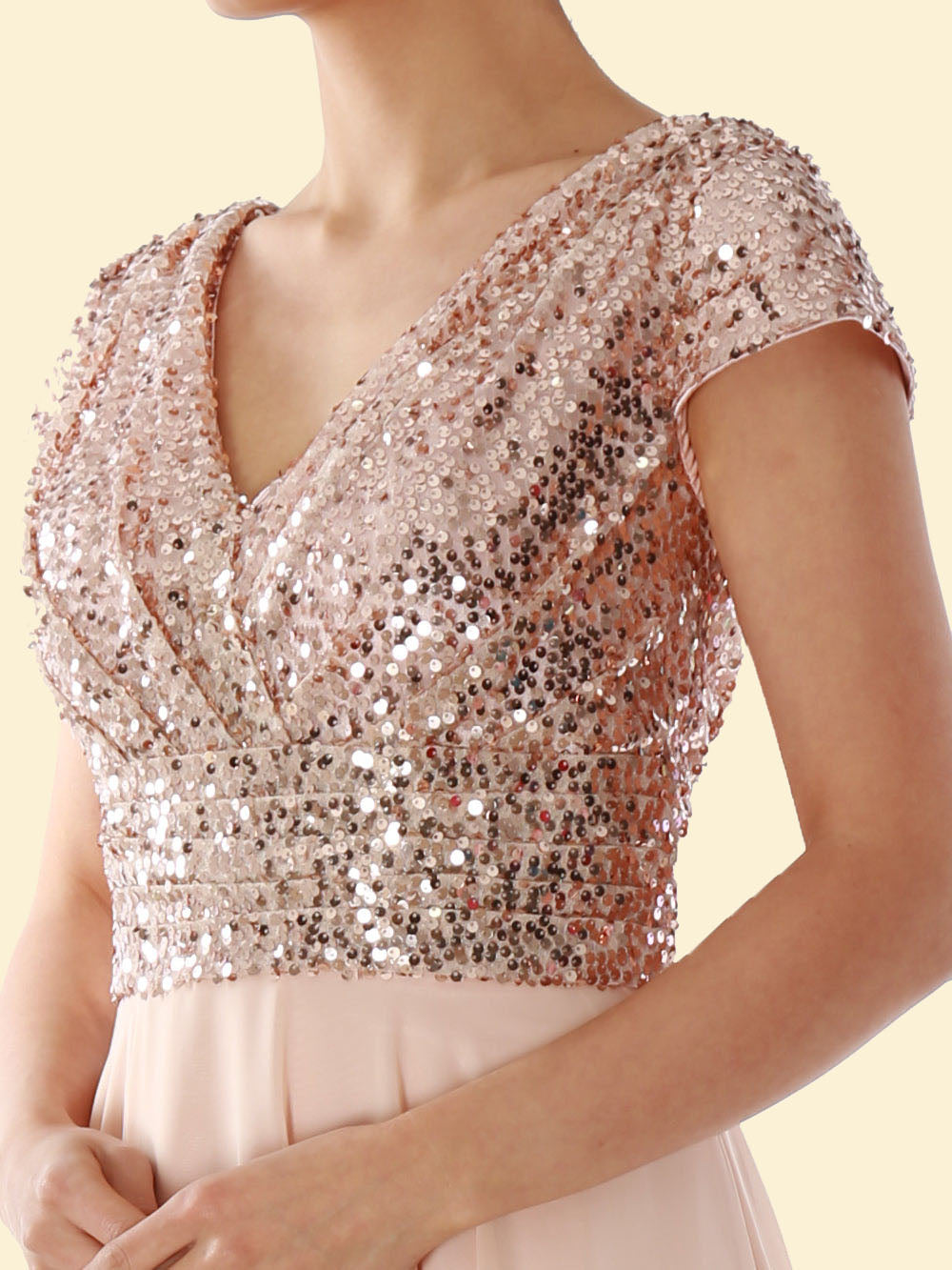 Close-up of the sequined V-neck bodice of a formal dress