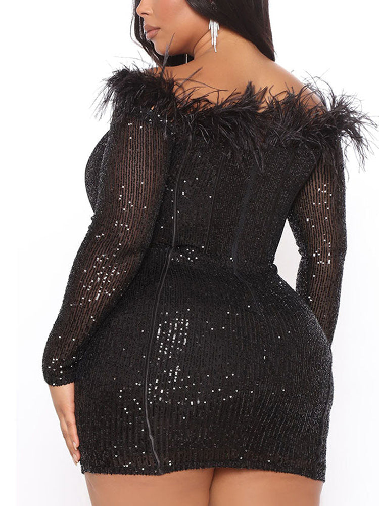 back view of a woman in a black sequined off-the-shoulder dress with feather trim