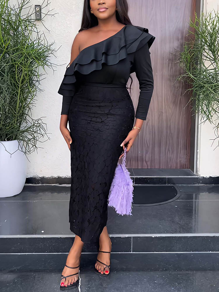Woman wearing a black one-shoulder dress with ruffle detail and lace skirt, holding a purple clutch.