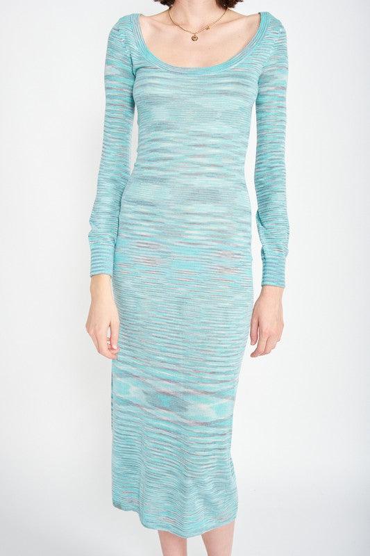 Close-up of a woman wearing a long-sleeved, scoop-neck, midi-length, bodycon dress with a striped pattern in shades of blue and grey.