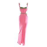 Back view of a pink and green maxi dress with a high slit