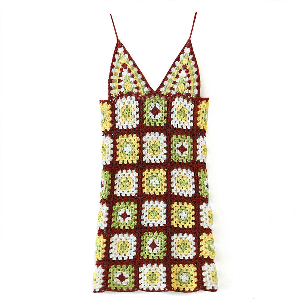 Crochet mini dress with a granny square pattern in brown, yellow, and green, featuring a v-neckline and spaghetti straps, displayed flat.