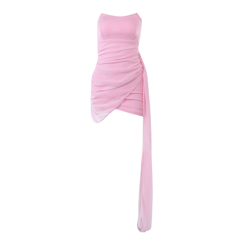 magenta strapless asymmetrical dress with ruched detailing and a long flowing train
