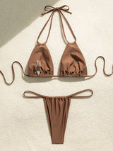 Brown bikini top and bottom laid flat with tag visible
