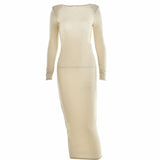 beige long-sleeved midi dress laid flat