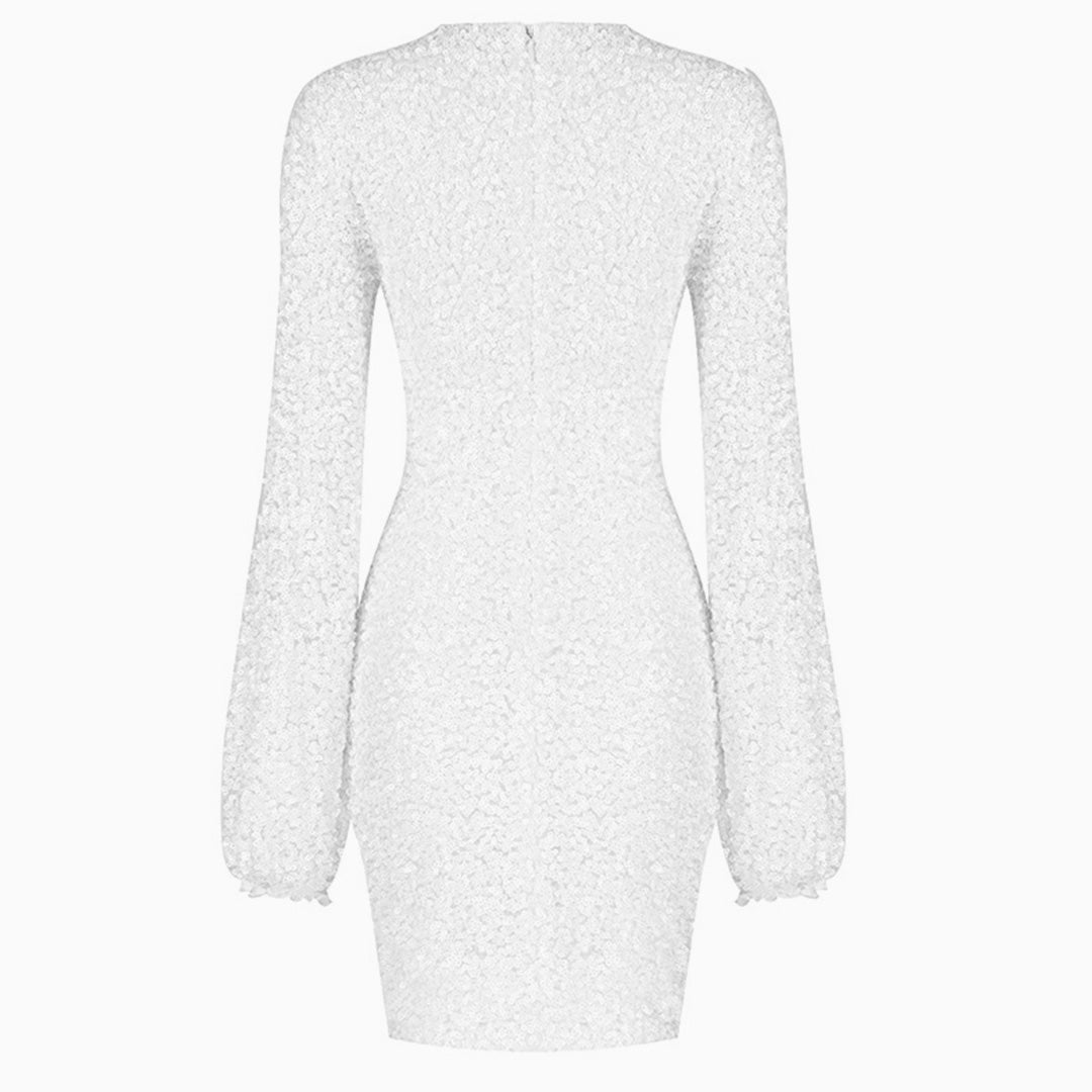 back view of a white sequined mini dress with long bishop sleeves