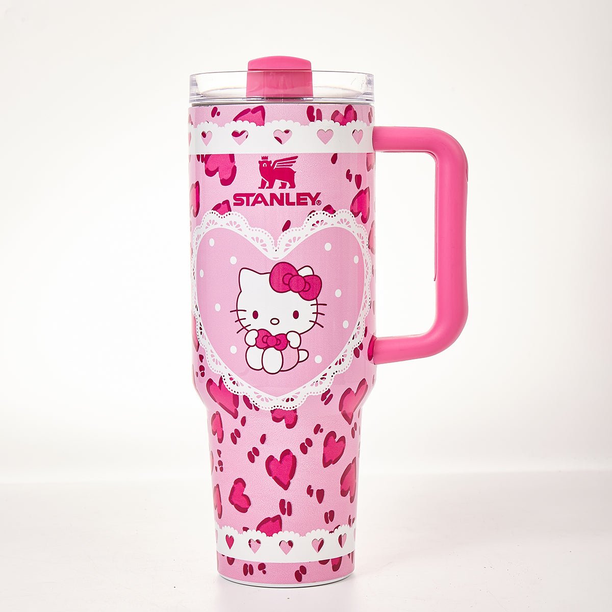 Pink Stanley tumbler with Hello Kitty graphic and heart pattern