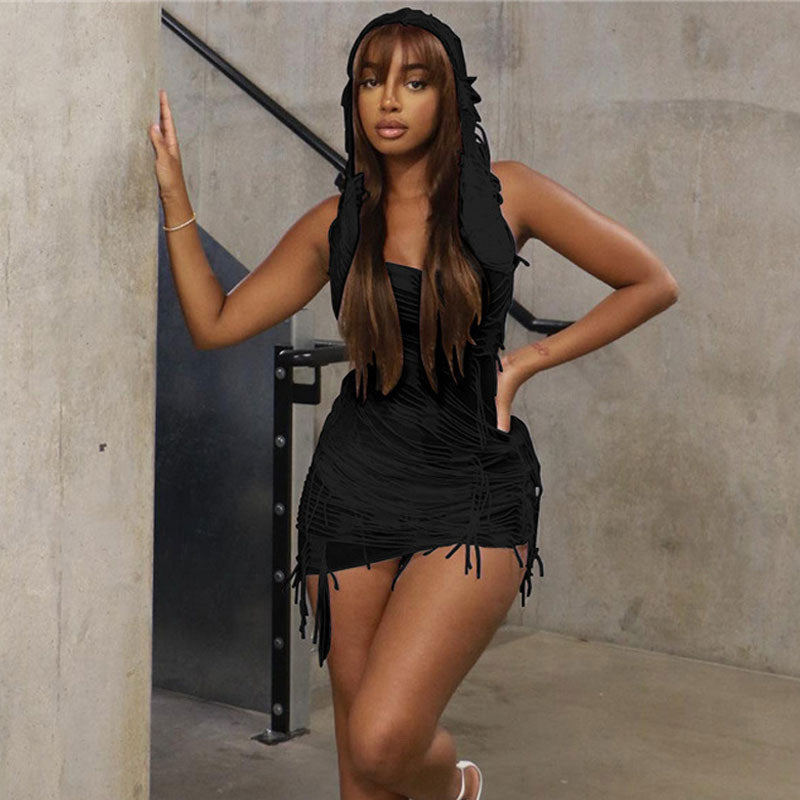 woman in black hooded fringe mini dress