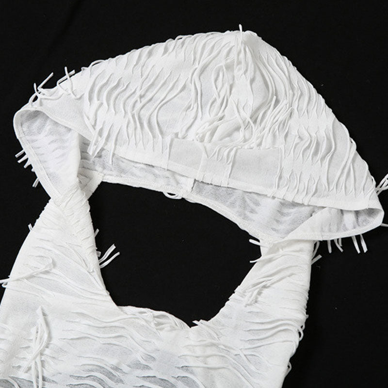 close-up of white hooded fringe fabric
