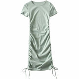 light green ruched short sleeve dress laid flat