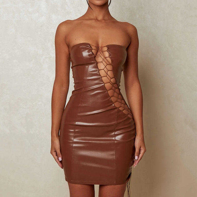 Woman wearing a brown strapless faux leather bodycon dress with lace-up side detailing