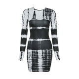 front view of a black and white tie-dye long-sleeved mini dress